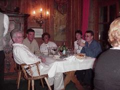 Al performs his world-famous 'leaning back on your chair until you fall over, taking the table-cloth and everyone's meal with you' trick.